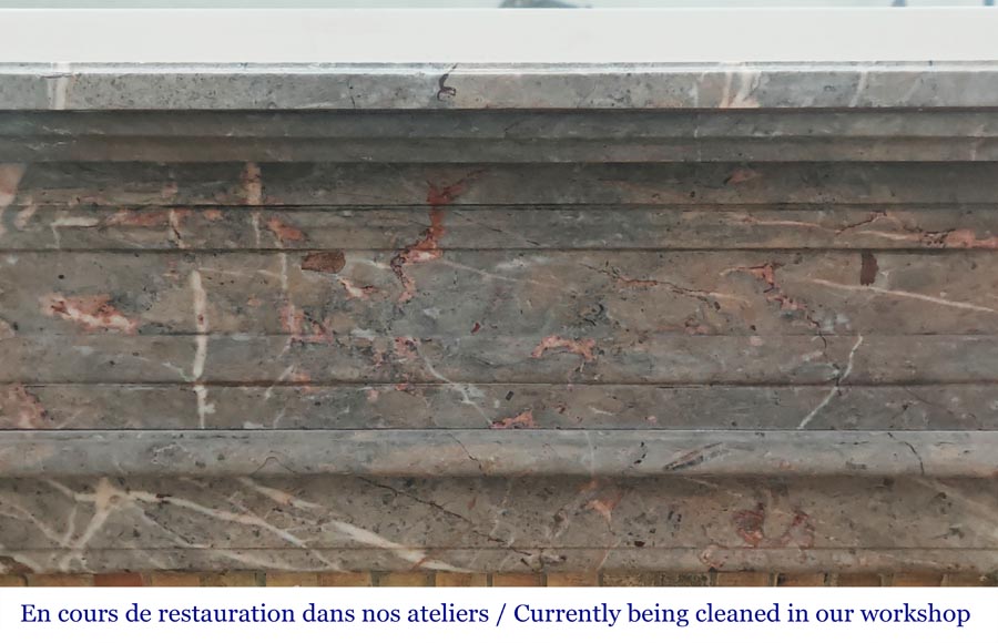 Cheminée de style Louis XVI aux pieds cannelés en marbre enjugerais-1