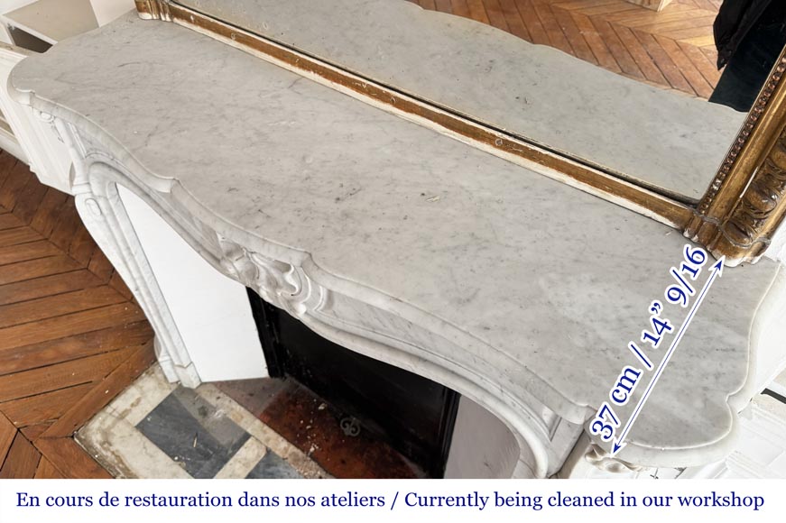 Cheminée de style Louis XV en marbre de Carrare, décorée d'une coquille-9