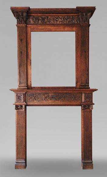 Cheminée de style Louis XVI en chêne, décorée d'une frise de feuille de chêne surmontée de son trumeau en chêne-0