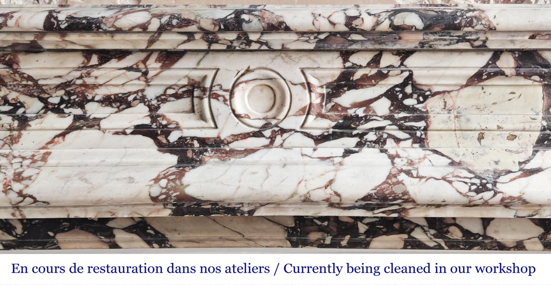 Cheminée de style Régence sculptée en brèche violette-1