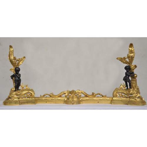Barre de chenets ancienne en bronze à deux patines aux enfants africains